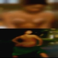 Muscular swinging tits